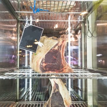 Display of Dry Aged Meat Steaks in butchers shop or restaurant in an display refrigerator